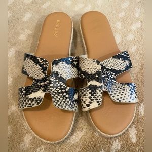 Snakeskin platform slip on sandals